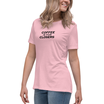 "Coffee Is For Closers" printed on a pink women's relaxed t-shirt worn by a female