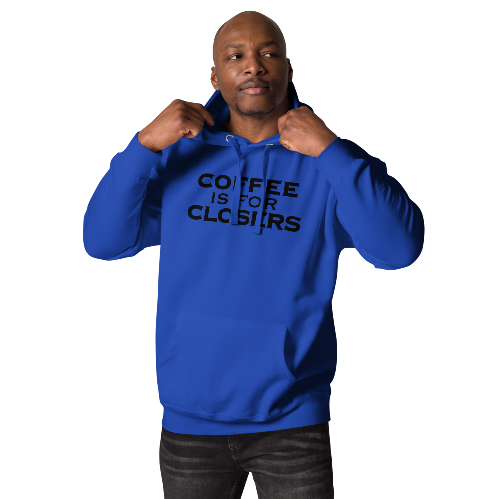 "Coffee Is For Closers" printed on a team royal unisex hoodie worn by a male
