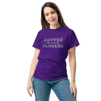 "Coffee Is For Closers" printed on a purple unisex classic tee worn by a female