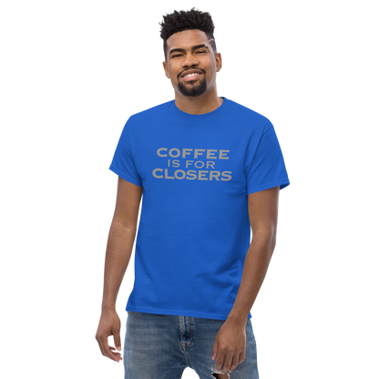 "Coffee Is For Closers" printed on a royal unisex classic tee worn by a male