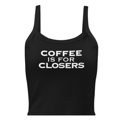 "Coffee Is For Closers" printed on a solid black blend women's micro-rib tanktop laying on a flat surface