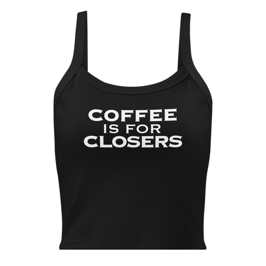 "Coffee Is For Closers" printed on a solid black blend women's micro-rib tanktop laying on a flat surface