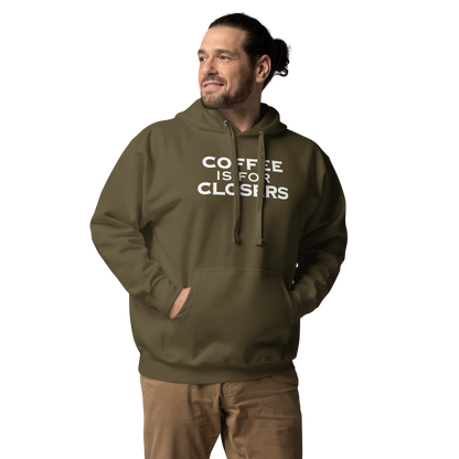 "Coffee Is For Closers" printed on a military green unisex hoodie worn by a male