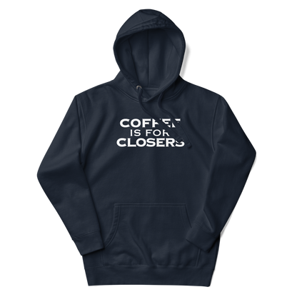 "Coffee Is For Closers" printed on a navy blazer unisex hoodie laying on a flat surface with the hood up