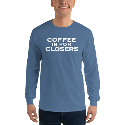 "Coffee Is For Closers" printed on a indigo blue men's long sleeve shirt worn by a male