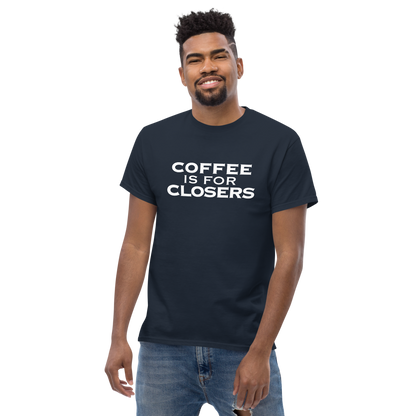 "Coffee Is For Closers" printed on a navy unisex classic tee worn by a male