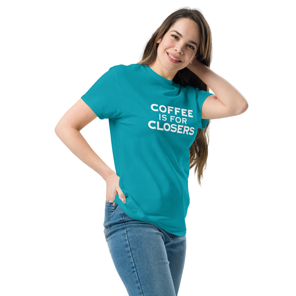 "Coffee Is For Closers" printed on a tropical blue unisex classic tee worn by a female