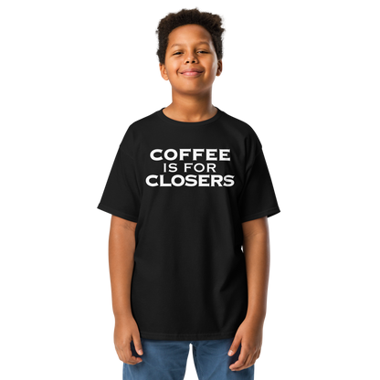 "Coffee Is For Closers" printed on a black youth classic tee worn by a male