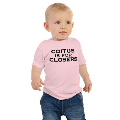 "Coitus Is For Closers" printed on a pink baby jersey short sleeve tee worn by a male