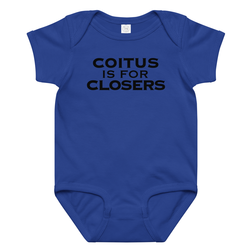 "Coitus Is For Closers" printed on a royal baby jersey bodysuit laying on a flat surface amongst other clothes