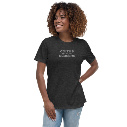 "Coitus Is For Closers" printed on a dark grey heather women's relaxed t-shirt worn by a female