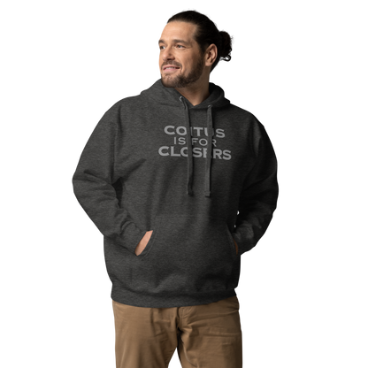 "Coitus Is For Closers" printed on a charcoal heather unisex hoodie worn by a male