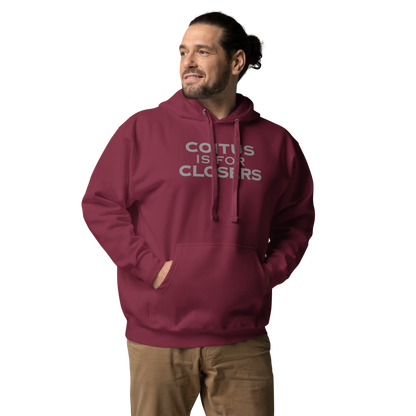 "Coitus Is For Closers" printed on a maroon unisex hoodie worn by a male