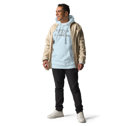 "Coitus Is For Closers" printed on a sky blue unisex hoodie worn by a male with a jacket on top