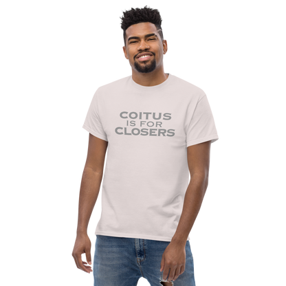 "Coitus Is For Closers" printed on a ice grey unisex classic tee worn by a male