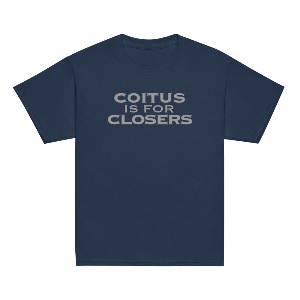 "Coitus Is For Closers" printed on a navy youth classic tee laying on a flat surface