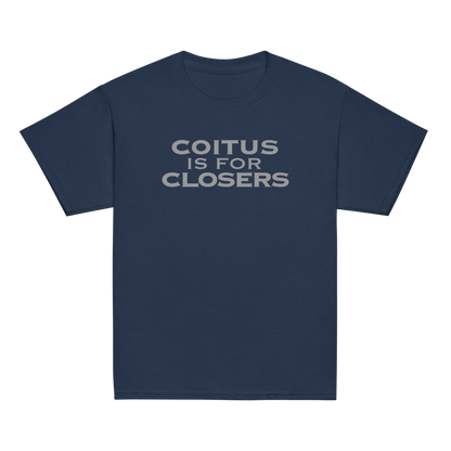 "Coitus Is For Closers" printed on a navy youth classic tee laying on a flat surface