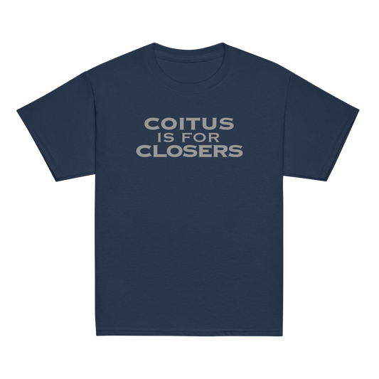 "Coitus Is For Closers" printed on a navy youth classic tee laying on a flat surface