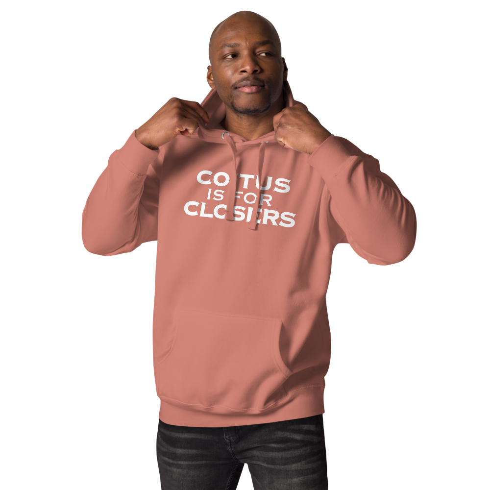 "Coitus Is For Closers" printed on a dusty rose unisex hoodie worn by a male