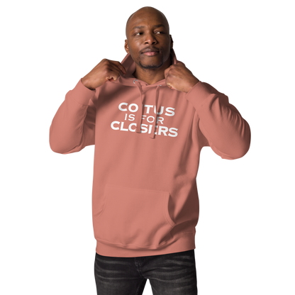 "Coitus Is For Closers" printed on a dusty rose unisex hoodie worn by a male