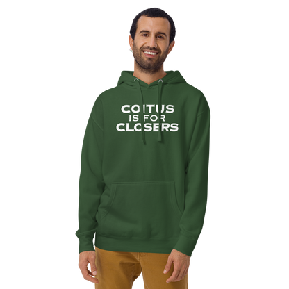 "Coitus Is For Closers" printed on a forest green warn by a male