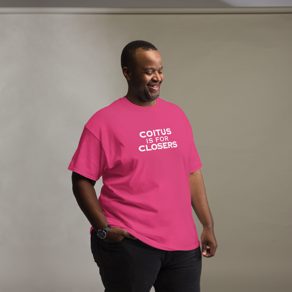 "Coitus Is For Closers" printed on a heliconia unisex classic tee worn by a male