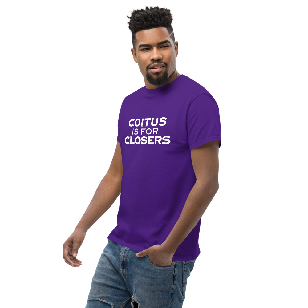 "Coitus Is For Closers" printed on a purple unisex classic tee worn by a male