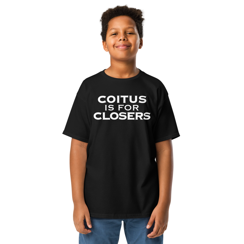 "Coitus Is For Closers" printed on a black youth classic tee worn by a male