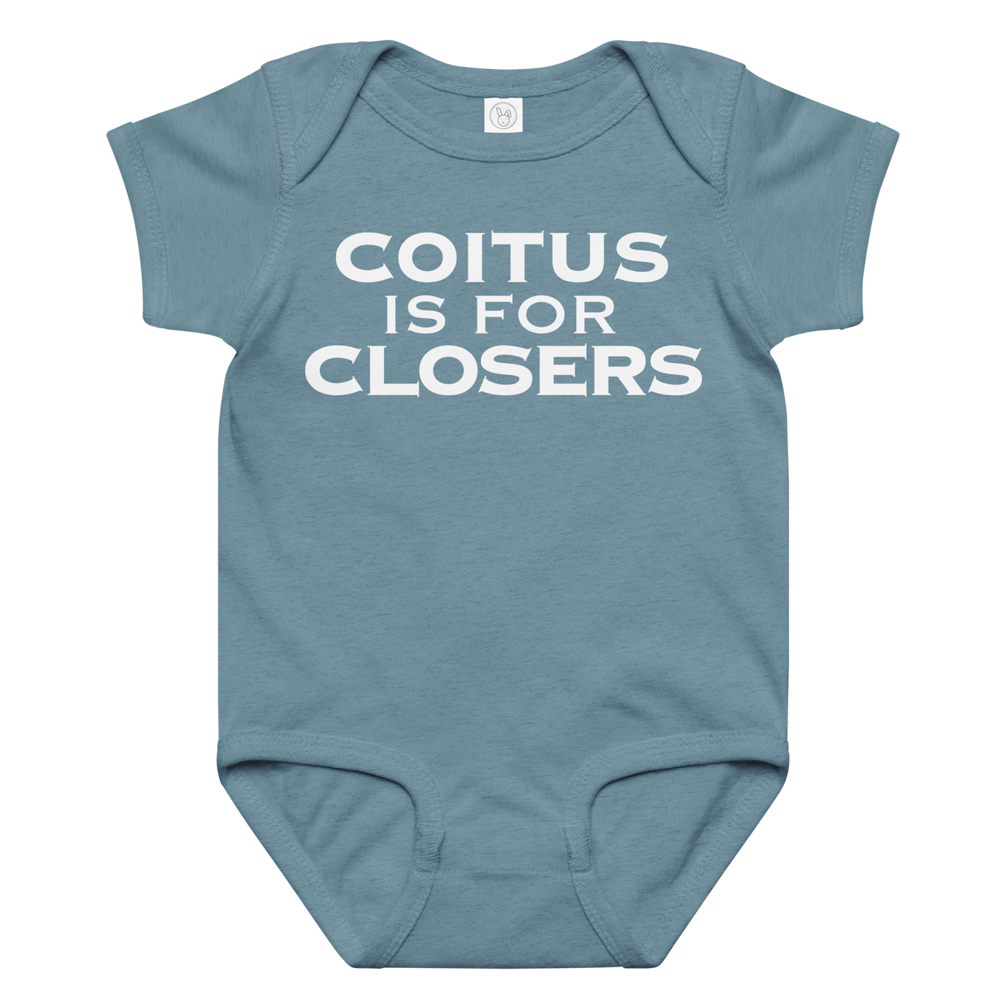 "Coitus Is For Closers" printed on a vintage indigo baby jersey bodysuit laying on a flat surface amongst other clothes