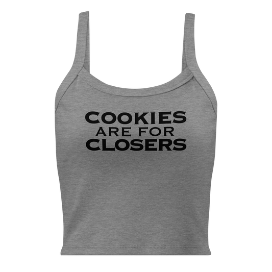 "Cookies Are For Closers" printed on a athletic heather women's micro-rib tanktop laying on a flat surface
