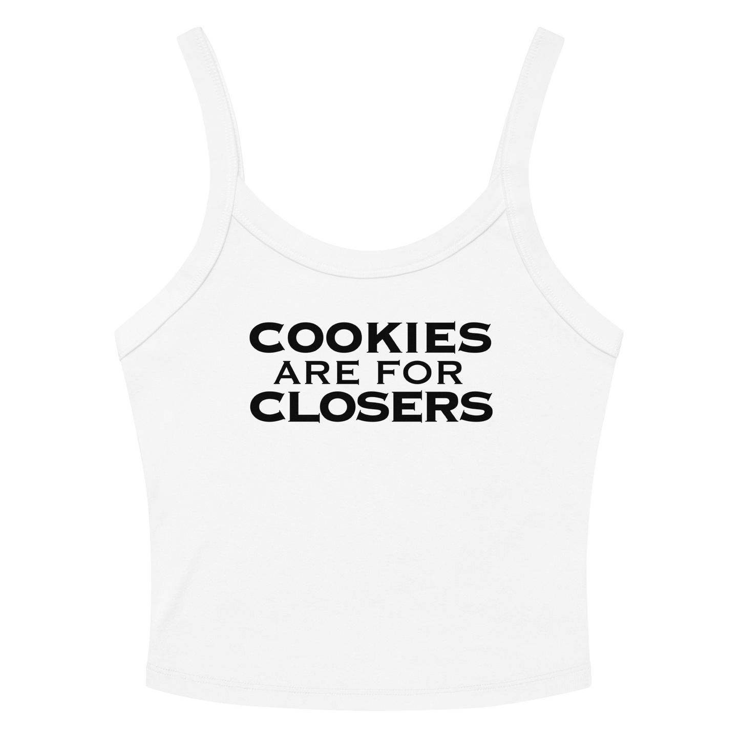 "Cookies Are For Closers" printed on a solid white blend women's micro-rib tanktop laying on a flat surface amongst sunglasses and shorts