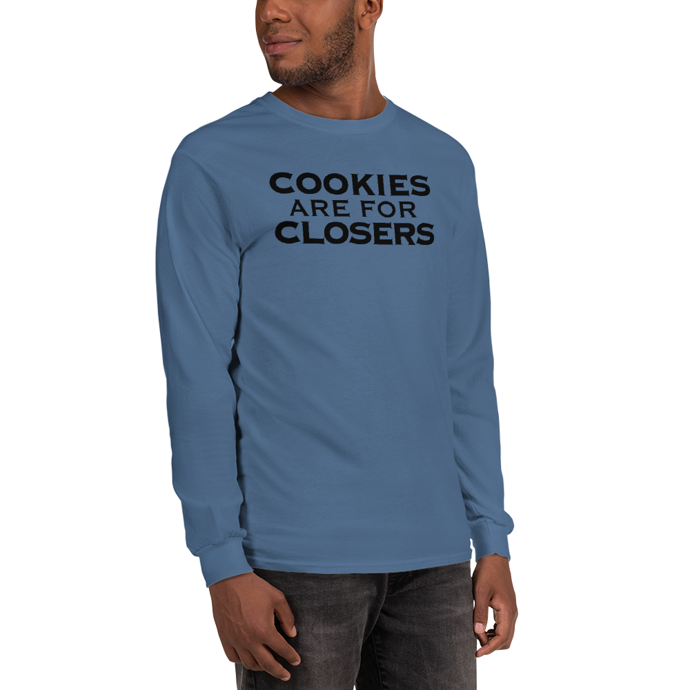 "Cookies Are For Closers" printed on a indigo blue men's long sleeve shirt worn by a male