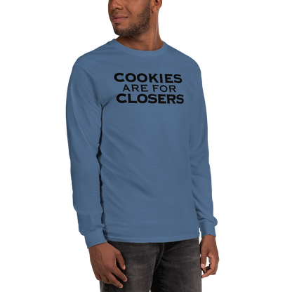 "Cookies Are For Closers" printed on a indigo blue men's long sleeve shirt worn by a male