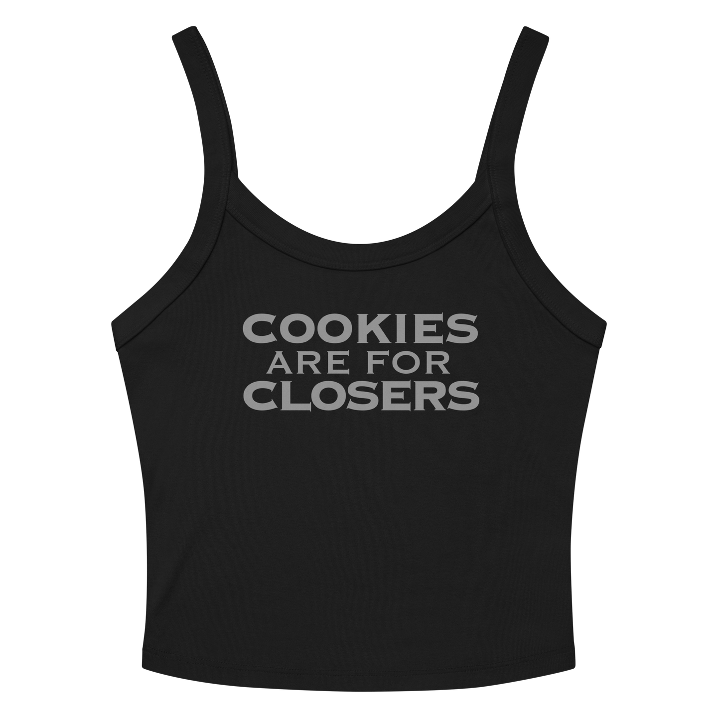 "Cookies Are For Closers" printed on a solid black blend women's micro-rib tanktop laying on a flat surface amongst sunglasses and shorts