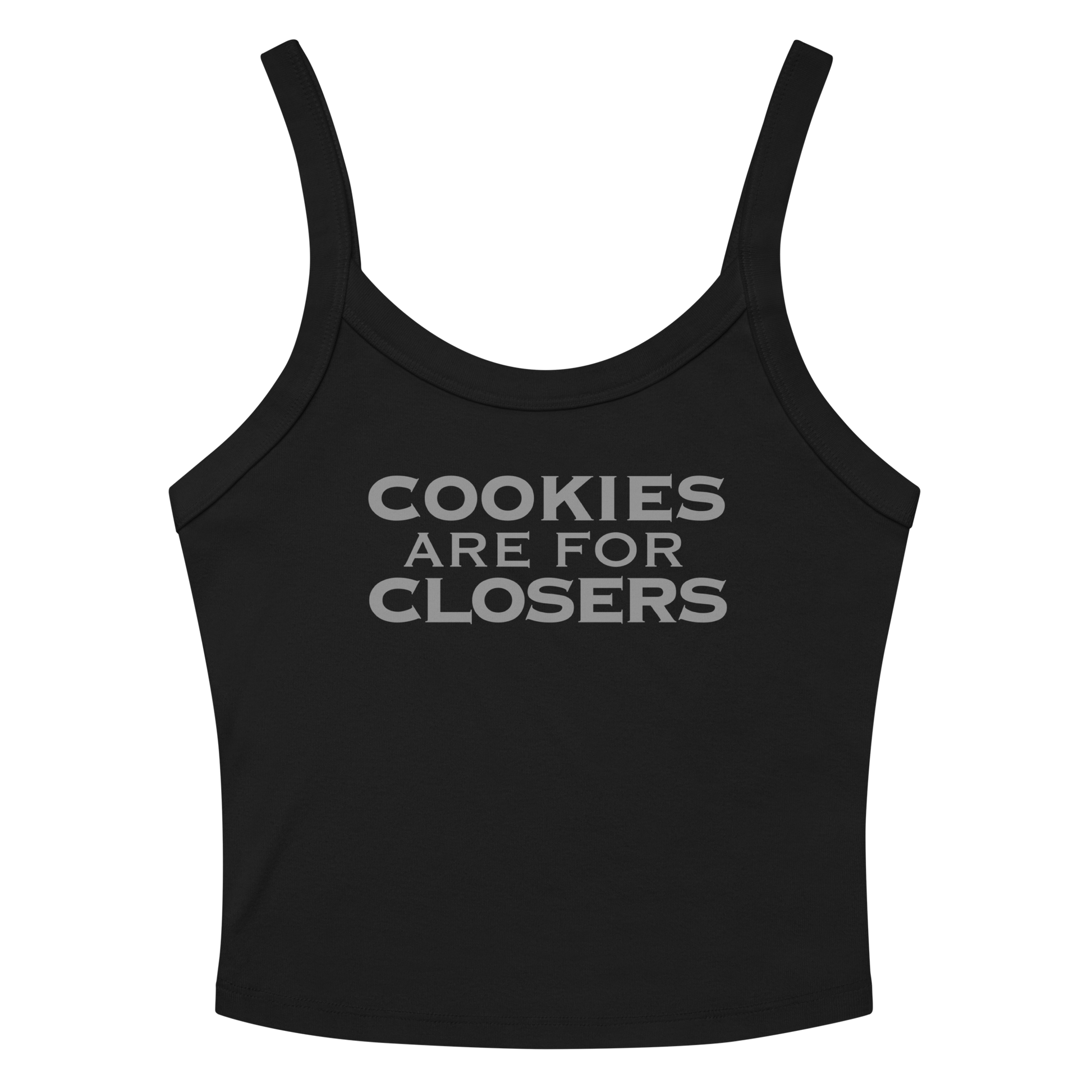 "Cookies Are For Closers" printed on a solid black blend women's micro-rib tanktop laying on a flat surface amongst sunglasses and shorts