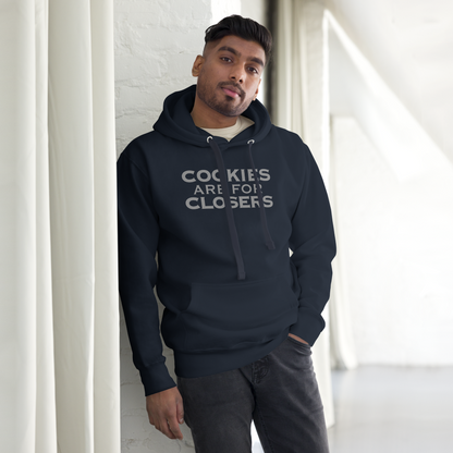 "Cookies Are For Closers" printed on a navy blazer unisex hoodie worn by a male