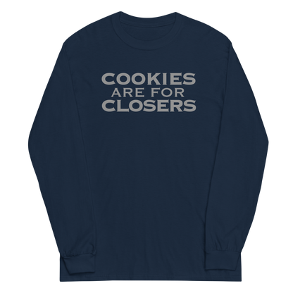 "Cookies Are For Closers" printed on a navy men's long sleeve shirt laying on a flat surface