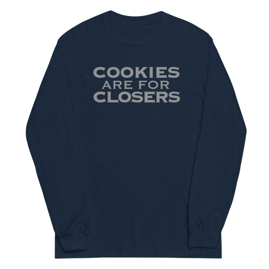 "Cookies Are For Closers" printed on a navy men's long sleeve shirt laying on a flat surface