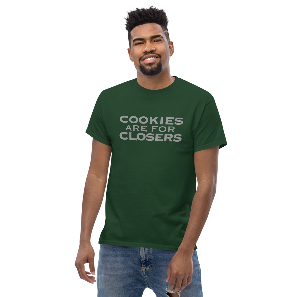 "Cookies Are For Closers" printed on a forest green unisex classic tee worn by a male