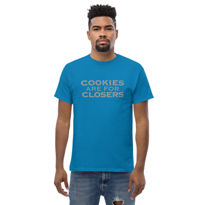 "Cookies Are For Closers" printed on a sapphire unisex classic tee worn by a male