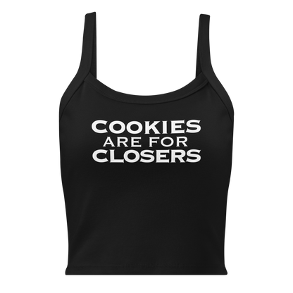 "Cookies Are For Closers" printed on a solid black blend women's micro-rib tanktop laying on a flat surface