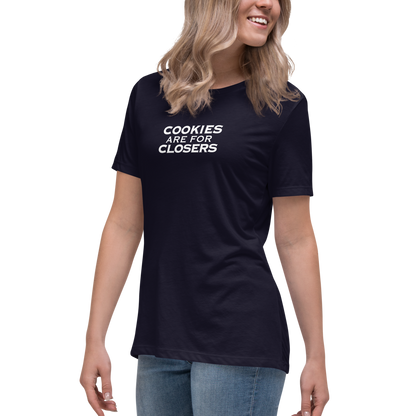 "Cookies Are For Closers" printed on a navy women's relaxed t-shirt worn by a female