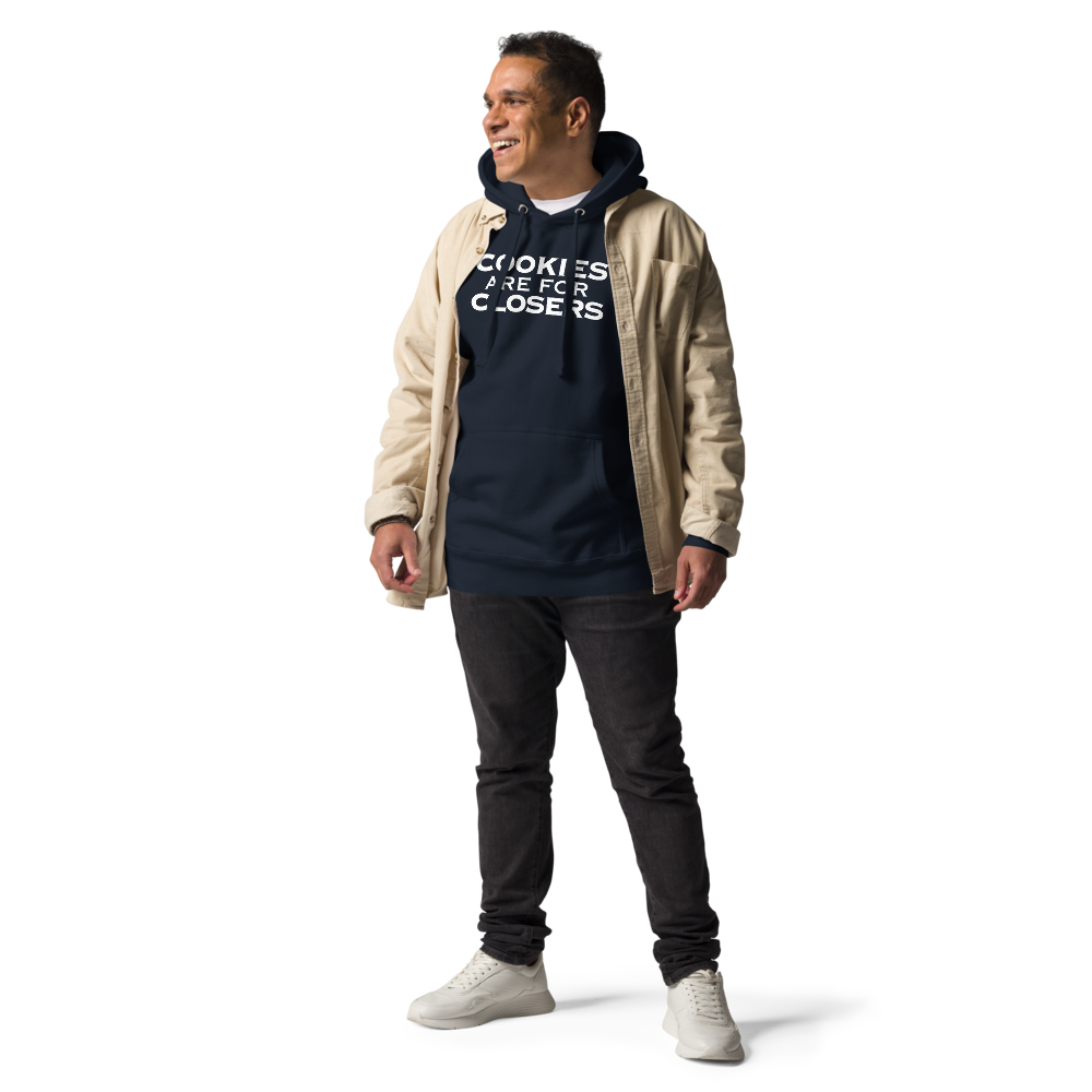 "Cookies Are For Closers" printed on a navy blazer unisex hoodie worn by a male with a jacket on top
