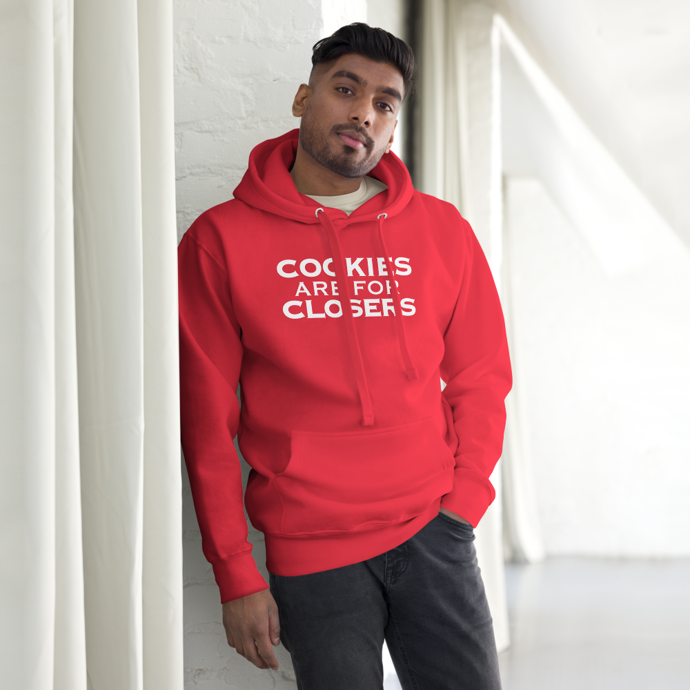 "Cookies Are For Closers" printed on a team red unisex hoodie worn by a male