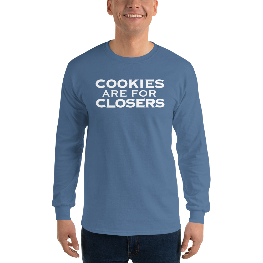 "Cookies Are For Closers" printed on a indigo blue men's long sleeve shirt worn by a male