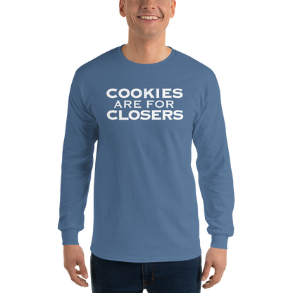 "Cookies Are For Closers" printed on a indigo blue men's long sleeve shirt worn by a male