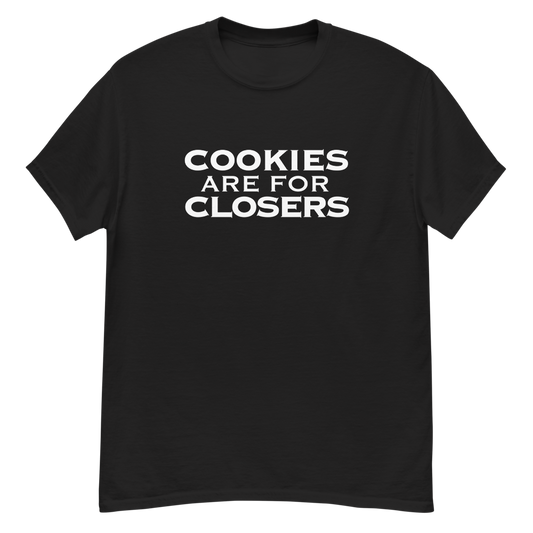 "Cookies Are For Closers" printed on a black unisex classic tee laying on a flat surface