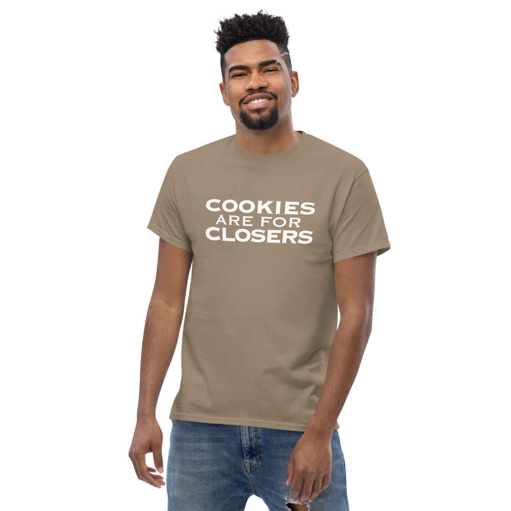 "Cookies Are For Closers" printed on a brown savana unisex classic tee worn by a male