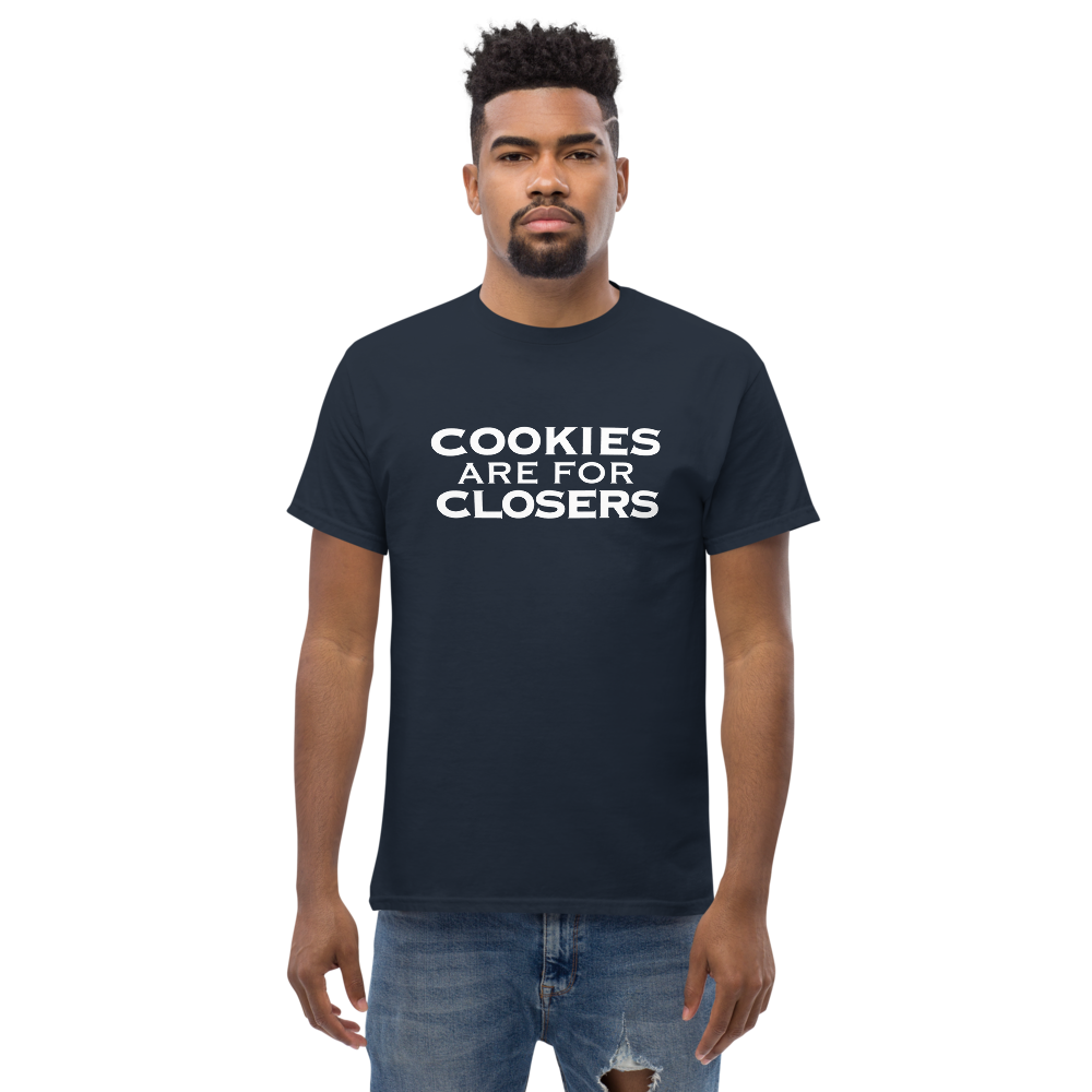 "Cookies Are For Closers" printed on a navy unisex classic tee worn by a male