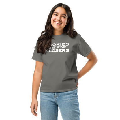 "Cookies Are For Closers" printed on a charcoal youth classic tee worn by a female